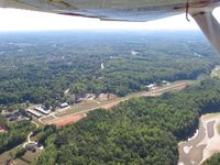  - turning downwind for runway 9 - by Tom Cooke