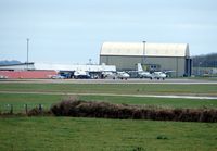  - Two Skybus Twin Otters on the apron waiting to start the days work - by Terry Fletcher