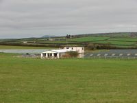  @ Bodmin Airfield Airport - Unusual to find the hangars below the level of the airstrip - by Terry Fletcher