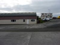 @ Bodmin Airfield Airport - Control Tower and side of main hangar - by Terry Fletcher