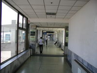  - Hallway lead to boarding gates - by Ken Wang