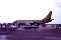  - Transair B737 CF-TAN early morning departure,June 1977 - by metricbolt