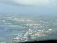  @ Antonio B. Won Pat International Airport (Guam International) - Base leg to runway 6 at Guam International - by John J. Boling