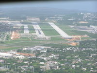  @ Antonio B. Won Pat International Airport (Guam International) - On final to runway 6L at Guam International - by John J. Boling