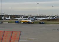  - A general view over the parking stands outside the Harrods Aviation hangars - by Terry Fletcher