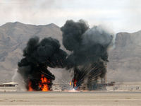  - Nellis AFB ATCT with smoke and fire from mock wargames. Aviation Nation 2007 - by Brad Campbell