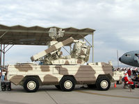  - I'm not sure what this is but it was on display at Aviation Nation 2007. What's more confusing is why Santa is sitting in front of it. - by Brad Campbell