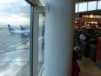  - There is a nice Cafe that overlooks the Ryanair ramp BEFORE you go airside - by Terry Fletcher