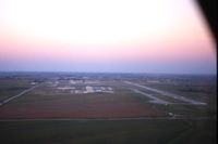  - Approaching to land Runway 9 in an Apache, I'm just riding along - by Glenn E. Chatfield