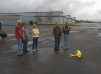 - Always an attraction-flying RC drones near Rwy 04 threshold on calm windless day. Tiger Moth drone on deck. Please access more drones and in-flight drones from my Aircraft Home Page - by Doug Robertson