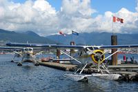  - Harbour Air seaplanes at Coal Harbour (Vancouver Downtown) - by Michel Teiten ( www.mablehome.com )