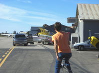  - Personal forms of SZP airport transportation include golf carts, motorcycles, motorscooters, bicycles, motorized bicycles and a ...UNICYCLE! Sammy Mason onboard. - by Doug Robertson