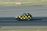  - Local control vehicle on its wa to the end of the runway - by Joop de Groot