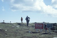  - St Mary's airport on the tiny island of St Mary's of the Scilly Isles off Cornwall, UK. A hiking trail around the island crosses the runway. The crossing is controlled by traffic lights. - by Henk van Capelle