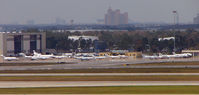  - A view across to the Galaxy Aviation ramp at Orlando International - by Terry Fletcher