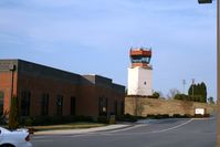  - A view of the FBO (Profile Aviation) and the control tower.  The picture was taken from the parking lot in front of the old terminal building. - by Bradley Bormuth