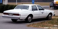  @ Franklin Muni-john Beverly Rose Airport - Riding in style in this airport car, an ex-police model - by Paul Perry