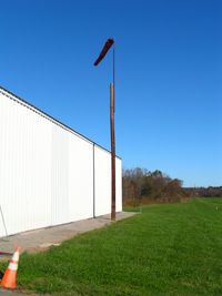  - A very colorful day led to this picture of the windsock. - by Bradley Bormuth
