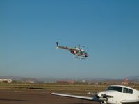  - A Jet Ranger across the tarmac. - by IndyPilot63