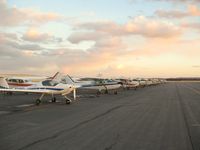  - Ramp Hotel in the evening... long row of C172s... - by Victor Agababov
