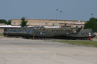  @ Draughon-miller Central Texas Regional Airport - Dyn-Corp refurbish center UH-1 lineup - by Zane Adams