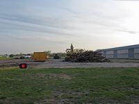  - The end of a hangar.  This hangar had a fire on Sunday 27-April-2008.  The unburnt part was torn down, and a new hangar will be built. - by Timothy Aanerud