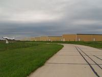  - CRETE AIRPORT HANGERS LOOKING NORTH - by Gary Schenaman