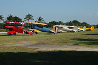  - Tail view of a/c at Vintage Weekend at Ocean Reef - by J.G. Handelman