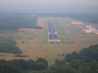  - short final on a hazy summer evening - by Tom Cooke