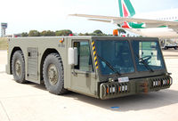  @ Pratica di Mare Air Force Base Airport - Pushback unit on Pratica di Mare AFB (Italy). - by Jorge Molina