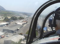  - Turning final for Rwy 22, off airport fire smoke ahead. Note: fire was burning brush, not an aircraft accident - by Doug Robertson