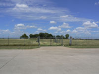  @ Jack Miller Airport - Jack Miller Stolport - Now closed by encroachment and development land fenced and recently sold hanger removed. The only clue as to its former use is a windsock pole.  - by Zane Adams