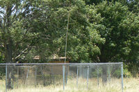 @ Jack Miller Airport - Jack Miller Stolport - Now closed by encroachment and development land fenced and recently sold hanger removed. The only clue as to its former use is a windsock pole.  - by Zane Adams
