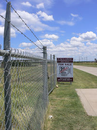  @ Jack Miller Airport - Jack Miller Stolport - Now closed by encroachment and development land fenced and recently sold hanger removed. The only clue as to its former use is a windsock pole.  - by Zane Adams