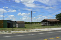  @ Flying L Airpark Airport - Flying L Private Strip - Unsure weather this airfield is still open. There is a fence and new subdivision of houses built with in yards of the hanger building, there was no airplane in the hanger and I could not see the runway - by Zane Adams