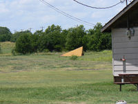  @ Flying L Airpark Airport - Flying L Private Strip - Unsure weather this airfield is still open. There is a fence and new subdivision of houses built with in yards of the hanger building, there was no airplane in the hanger and I could not see the runway - by Zane Adams
