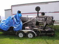  - Cessna 150 that was burned in a hangar fire at Fleming Field (SGS). - by Mitch Sando