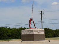  - The entrance sign (from the side) to Dallas Executive (Redbird) Airport - by Zane Adams