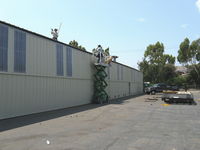  - Enclosing open hangars and or adding translucent fiberglass panels - by Doug Robertson