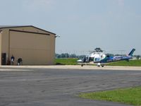  @ Bluffton Airport - Grilling lunch outside the Life Flight hanger - by Bob Simmermon