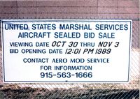  @ Midland International Airport - Auction sign for aircraft at Midland (N7041U - N117GA among others) - by Zane Adams
