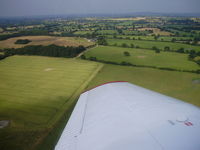  - banking left just after take-off - by Chris Hall