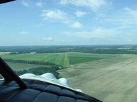  - On final at Geneseo in a Stinson SR-9C. - by Terry L. Swann