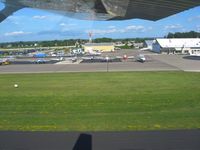  @ Fond Du Lac County Airport - FBO to the right, departing 36. - by Bob Simmermon