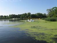  - Vette/Blust EAA Seaplane Base, green backwater lagoon float ties - by Doug Robertson