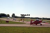  - EAA AirVenture 2008, departures waiting for P-38 Ruff Stuff to land - by Timothy Aanerud