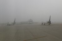  - Early morning fog and the UPS ramp with two 757s - by Glenn E. Chatfield