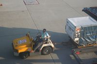  - Waiting for baggages near an A330 from Dragonair - by Michel Teiten ( www.mablehome.com )