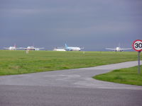  - 3.00pm at Manchester Airport with six aircraft waiting for runway 23L to reopen for afternoon flights - by chris hall