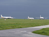  - Three Monarch Airbuses and a Jet2 Boeing 737 waiting to depart - by Chris Hall